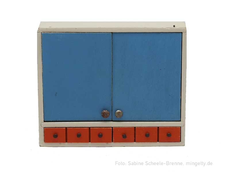 HÃ¤ngeschrank mit roten Schubladen