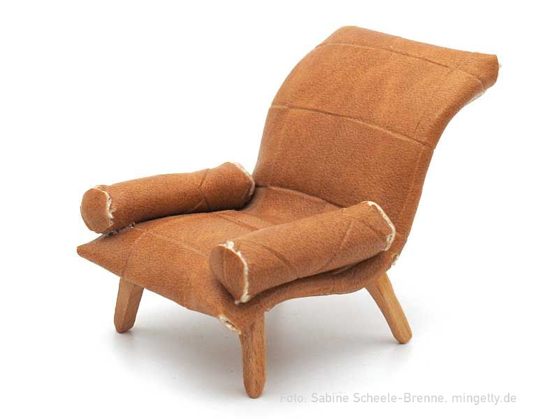 Brauner Kunstledersessel